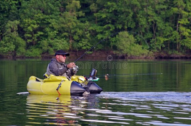 fishing-float-tube-fisherman-fight-against-pike-man-sitting-inflatable-boat-use-flippers-to-mo...jpg