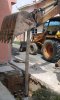IMG_4067 Pressing Wood Pile into place.JPG