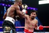 2012-06-10T042606Z_1785635112_GM2E86A0YHT01_RTRMADP_3_BOXING-PACQUIAO.JPG