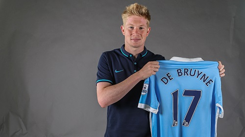 Kev shirt holding shot backdrop.jpg